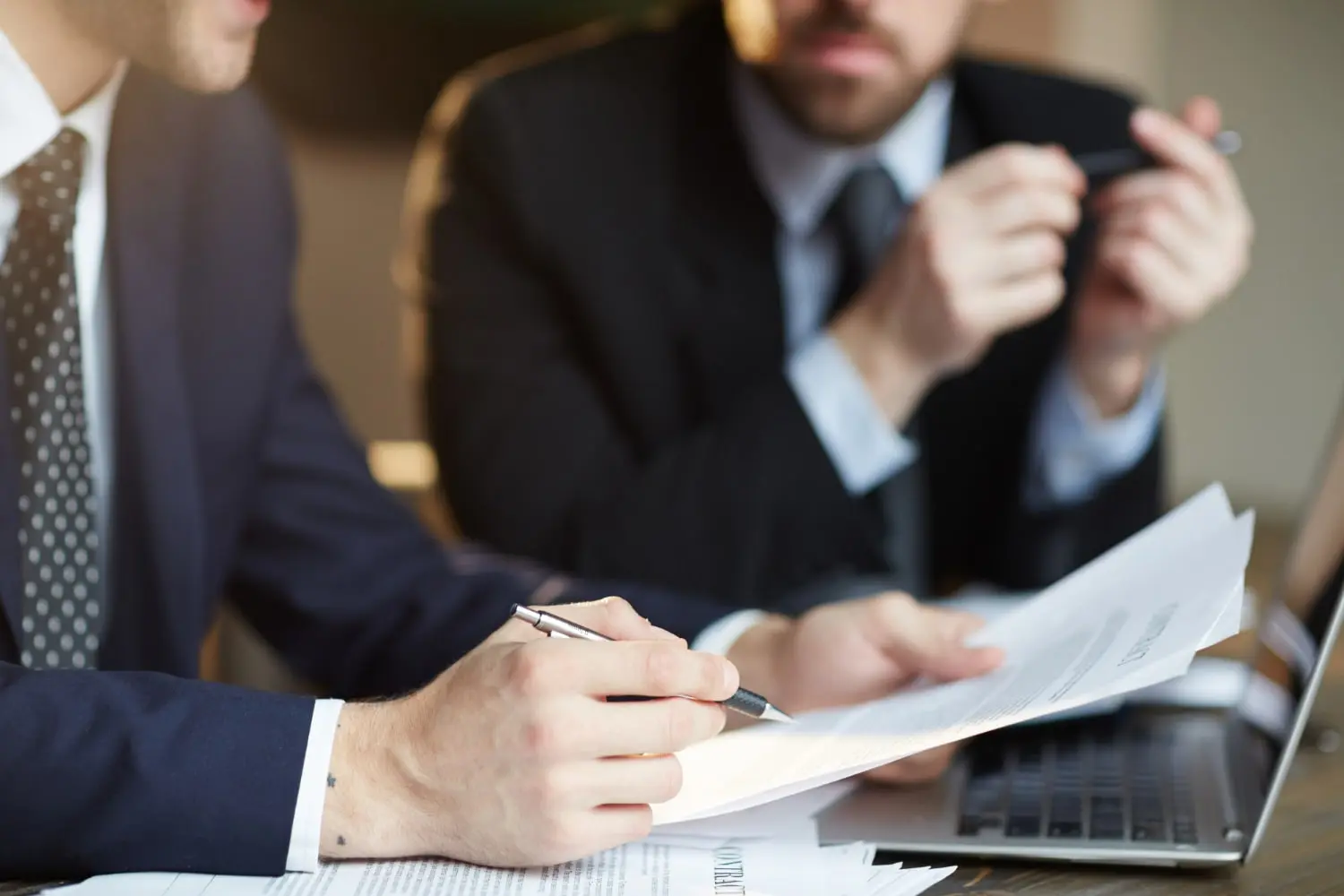 Two men or lawyers talking about a business contract